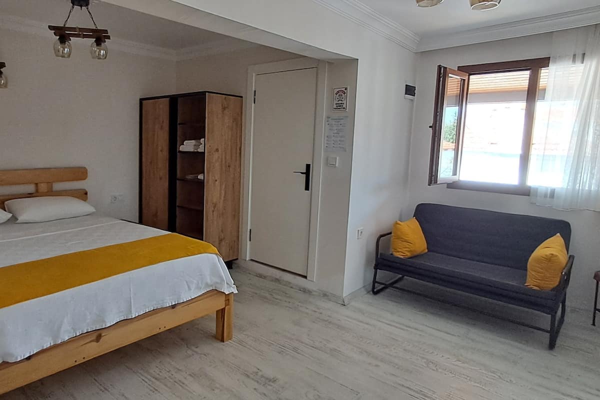 Standard Room, Multiple Beds, Non Smoking, Garden View | Minibar, desk, laptop workspace, free WiFi