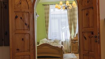 Presidential Apartment | Desk, laptop workspace, blackout drapes, iron/ironing board