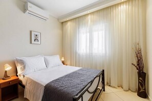 2 dormitorios, tabla de planchar con plancha, wifi