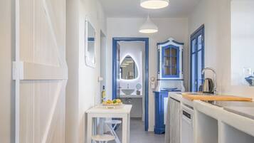 Comfort House, Patio, Sea View | Private kitchen | Fridge, microwave, stovetop, dishwasher