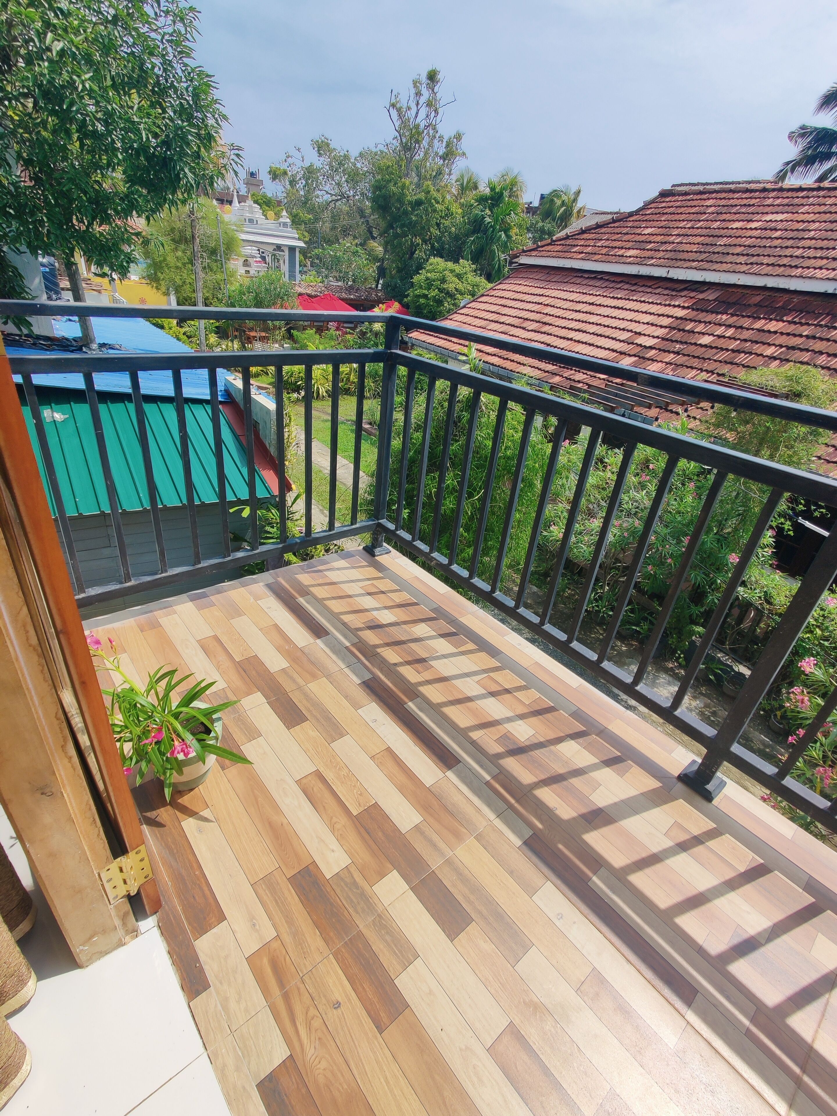 Habitación doble Confort, vista al jardín | Vista del balcón