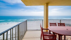 A balcony with a view of the beach and ocean. - Phoenix Iv 4095 3 Bedroom Condo (Orange Beach)