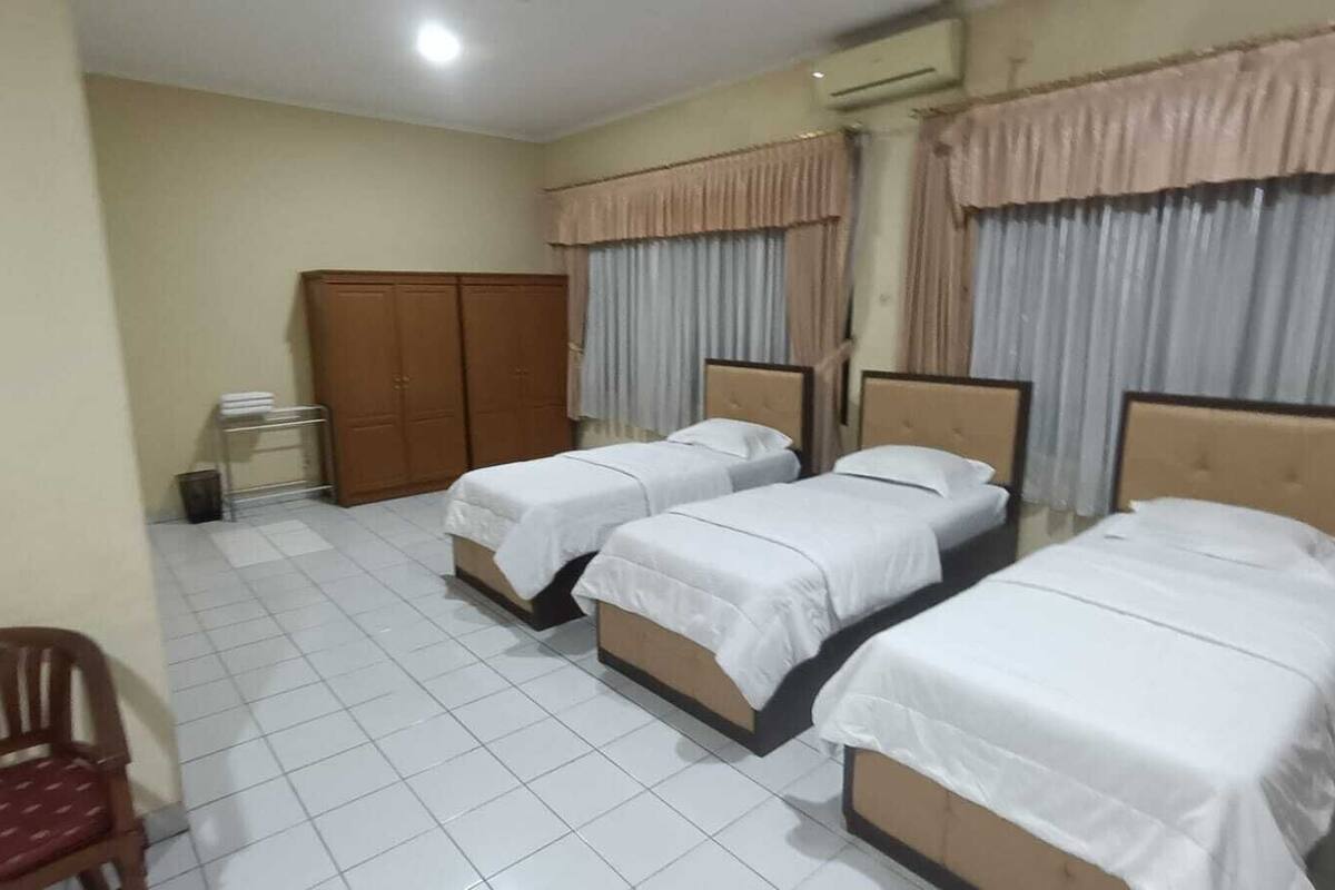 Junior Triple Room, Partial Lake View | Desk, laptop workspace, iron/ironing board, free WiFi