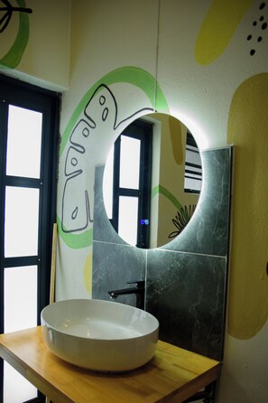 Shower, towels, soap, toilet paper