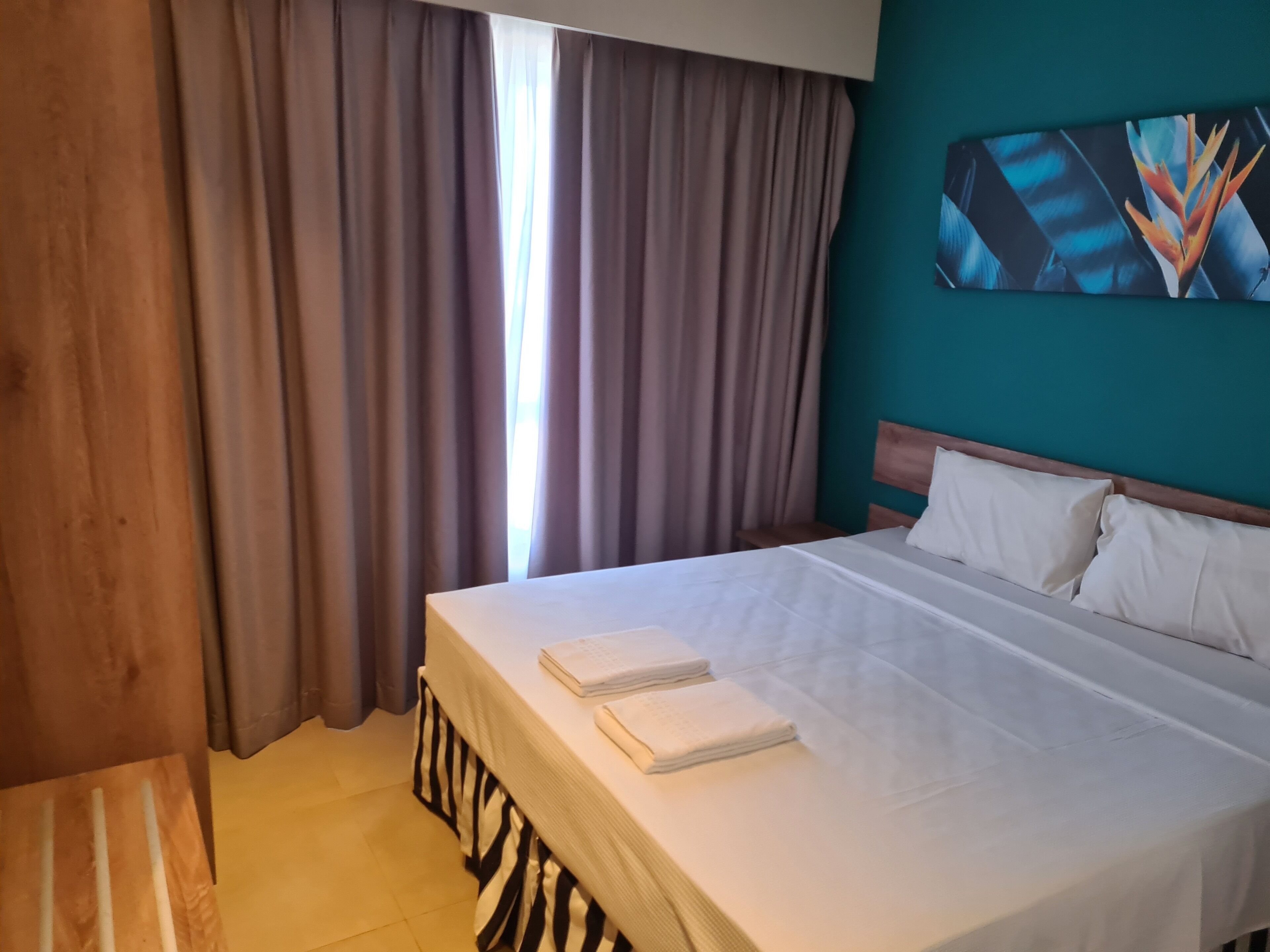 Family Apartment, Balcony | Minibar, free WiFi, bed sheets