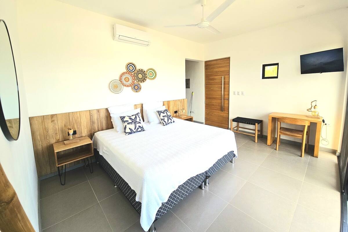 Deluxe Quadruple Room, Sea View | In-room safe, blackout drapes, iron/ironing board, free WiFi