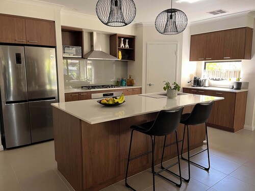 Mid-century Elegance in a leafy garden