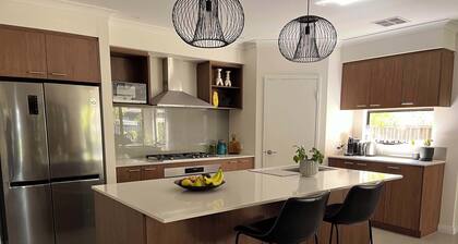 Mid-century Elegance in a leafy garden