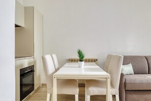 Apartment, 1 Double Bed with Sofa bed | Private kitchen | Electric kettle, dining tables - Chic flat with easy city centre access (Milan)