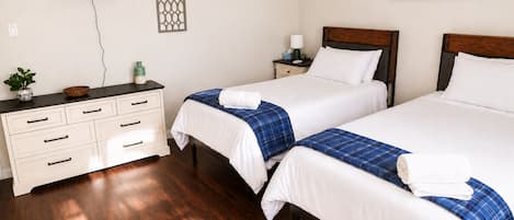 4 bedrooms, desk, iron/ironing board, travel crib