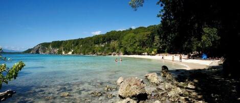 On the beach, sun loungers