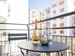 Superior Triple Room, Balcony, City View | Balcony