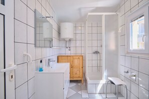 Hair dryer, towels, soap, toilet paper