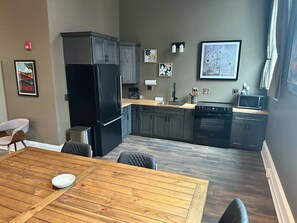 Fridge, oven, coffee/tea maker, cookware/dishes/utensils