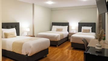 Family Triple Room | Hypo-allergenic bedding, down duvets, pillow-top beds, desk