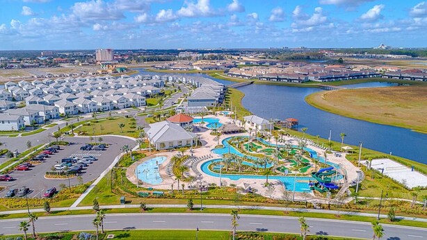 A residential area with a swimming pool and a marina. - 2 Bedrooms Apartment  in Storey Lake (Kissimmee)