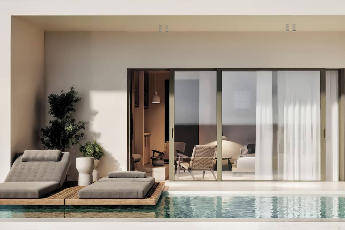 Premium studio suite | Zwembad | Een buitenzwembad, parasols bij het zwembad en ligstoelen