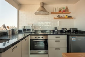 Superior Studio, City View | Private kitchen | Coffee/tea maker, electric kettle
