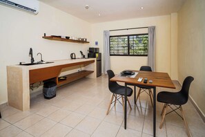 Fridge, microwave, stovetop, coffee/tea maker