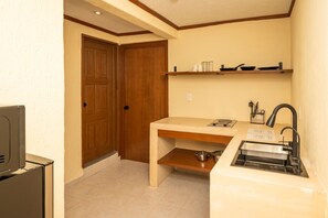 Fridge, microwave, stovetop, coffee/tea maker
