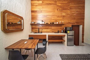 Fridge, microwave, stovetop, coffee/tea maker