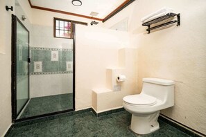 Shower, hair dryer, towels, shampoo