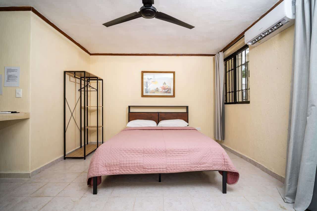 What we all need at night — a cozy place to rest, complete with blackout curtains air conditioner and ceiling fan for uninterrupted sleep. And why not during the day too? 🌙🛏️