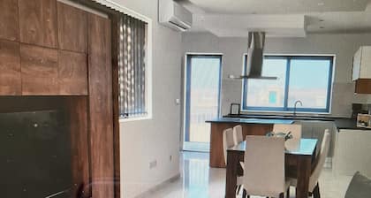 Qawra Luxury Penthouse with Roof Terrace, Sea views.