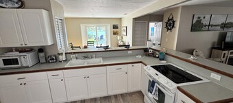 Indian Water Lodge is a waterfront retreat with Dockage, Kayaks, Bikes & More!