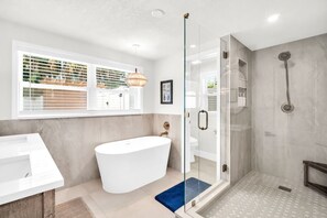 Jetted tub, hair dryer, towels, soap