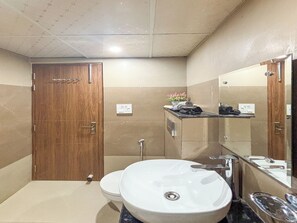 Studio, City View | Bathroom | Shower, free toiletries, slippers, soap - Housr Sector 28 Golf Course Road Next To Phase 1 Metro Station (Gurugram)