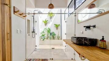 Shower, hair dryer, towels, soap