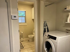 Hair dryer, towels, soap, toilet paper
