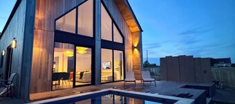 Villa Des Sables Blancs•Outdoor swimming pool heated to 29°C-View of the bay