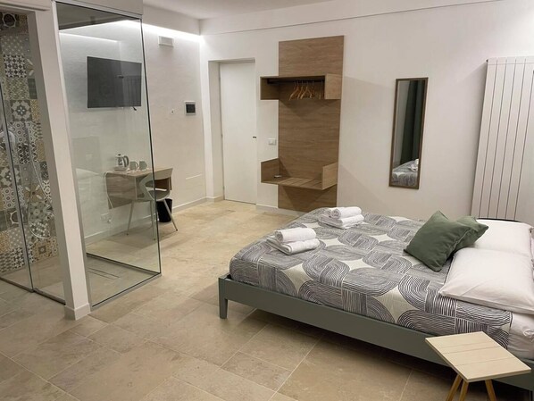 Hypo-allergenic bedding, down duvets, memory-foam beds, minibar