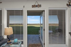 Condo | Living area | Flat-screen TV - Beachfront by South Padre Resort Rentals (South Padre Island)