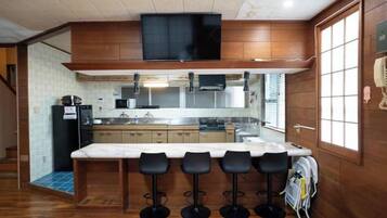 Fridge, microwave, electric kettle, high chair