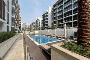 Pool - Luxurious 1BR Living in Azizi Riviera 39 (Dubai)