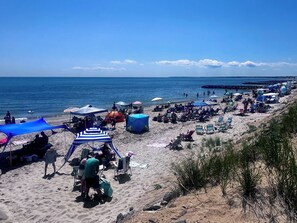 On the beach, sun-loungers