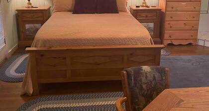 Charming 2-bedroom cottage right on a 30’ wide whitewater creek in Reliance, TN