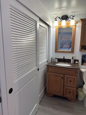 Hair dryer, towels, soap, toilet paper