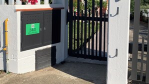 A gated entrance with a concrete archway, a sign with the number 61, and a plaque labeled 'Villa Rosa'. - B&B VILLAROSA - your dream vacation between sea and mountains (Abruzzo)