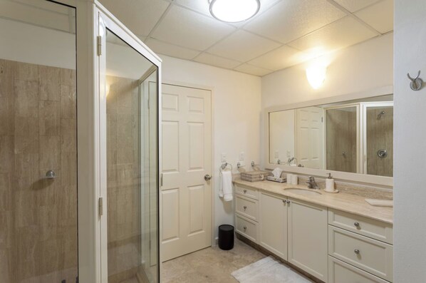 Shower, hair dryer, towels, soap