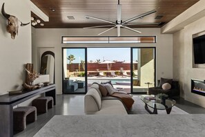 TV, fireplace - Windsong | Modern compound w pool & spa (Yucca Valley)