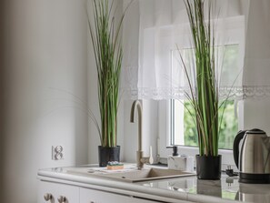 Réfrigérateur, four, plaque de cuisson