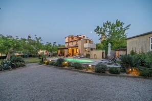 A two-story house with a swimming pool, surrounded by gravel and greenery. - Villa Ivona (Kvarner - Poljica) (Poljica)