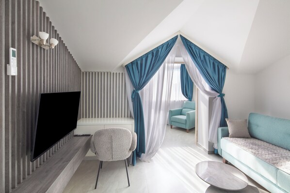 Comfort-Apartment, Balkon | Wohnbereich