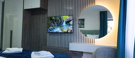 Deluxe Triple Room, Balcony, City View | Desk, free WiFi