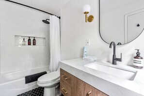 Hair dryer, towels, soap, toilet paper