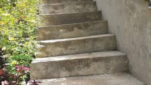 A concrete staircase with steps leading up to a building. - Duet hearts (Ella)